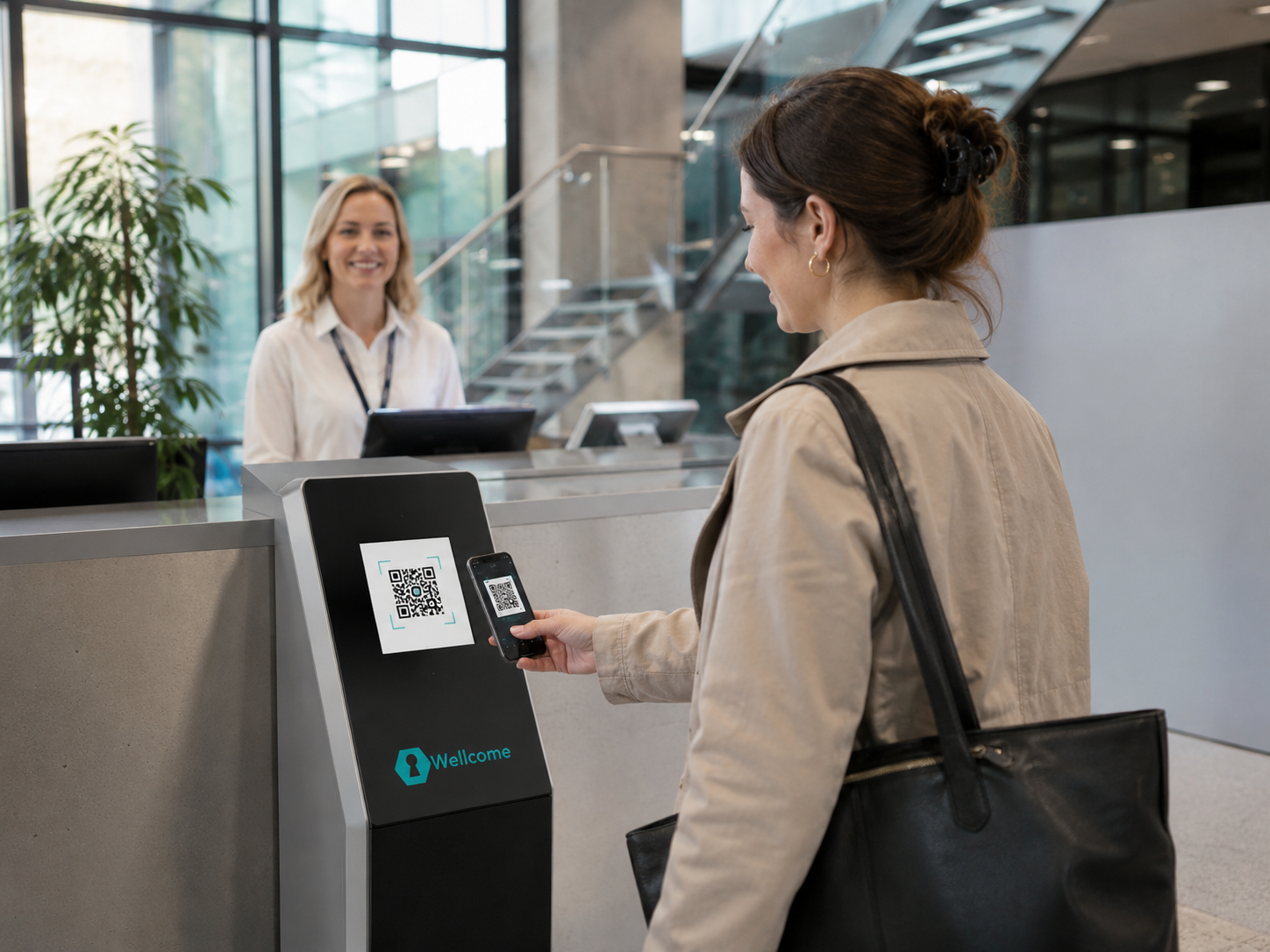 Resepsiyonda Wellcome QR kiosk üzerinden ziyaretçi kaydı yapılırken